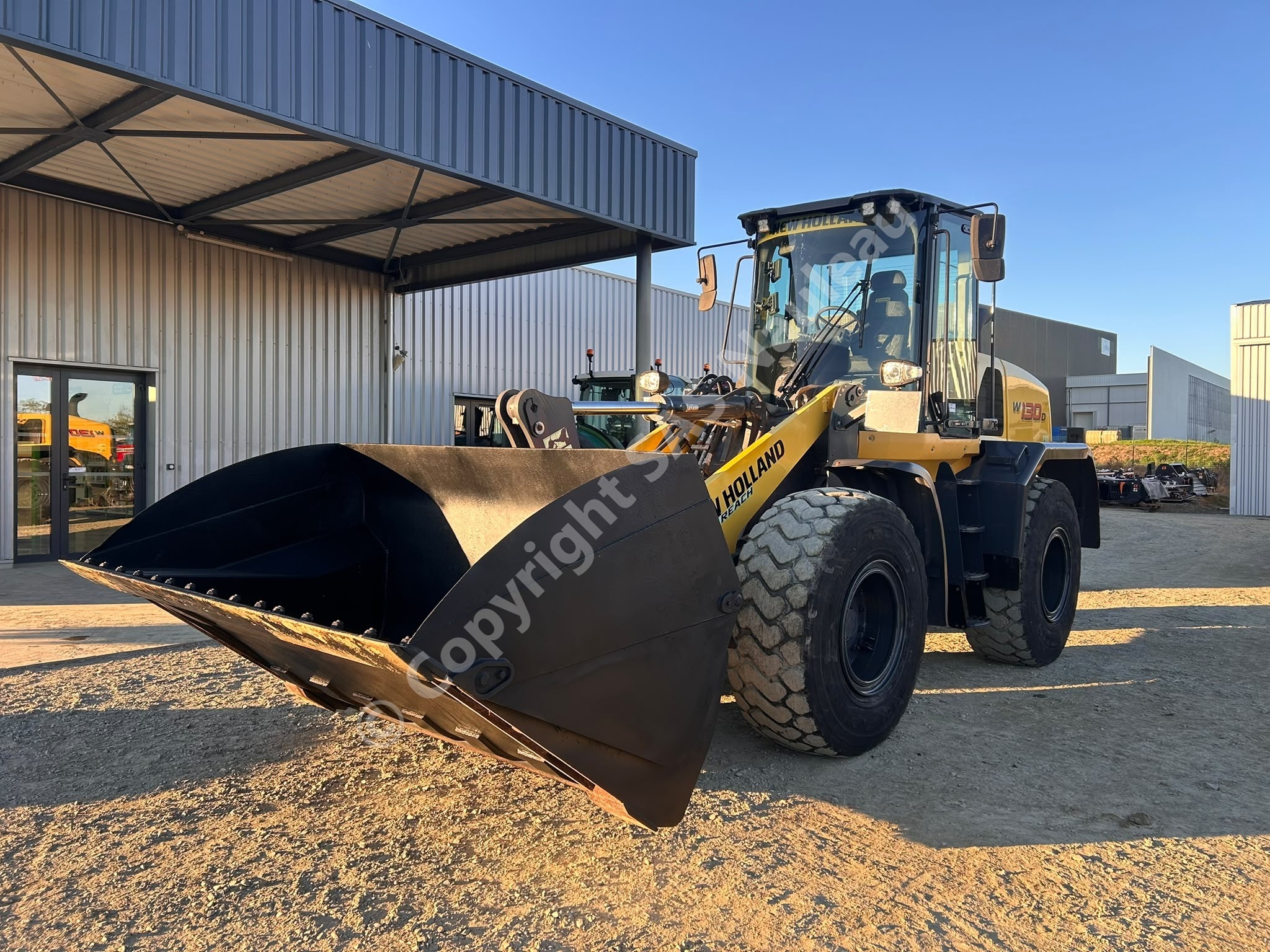 NEW HOLLAND W 130 D