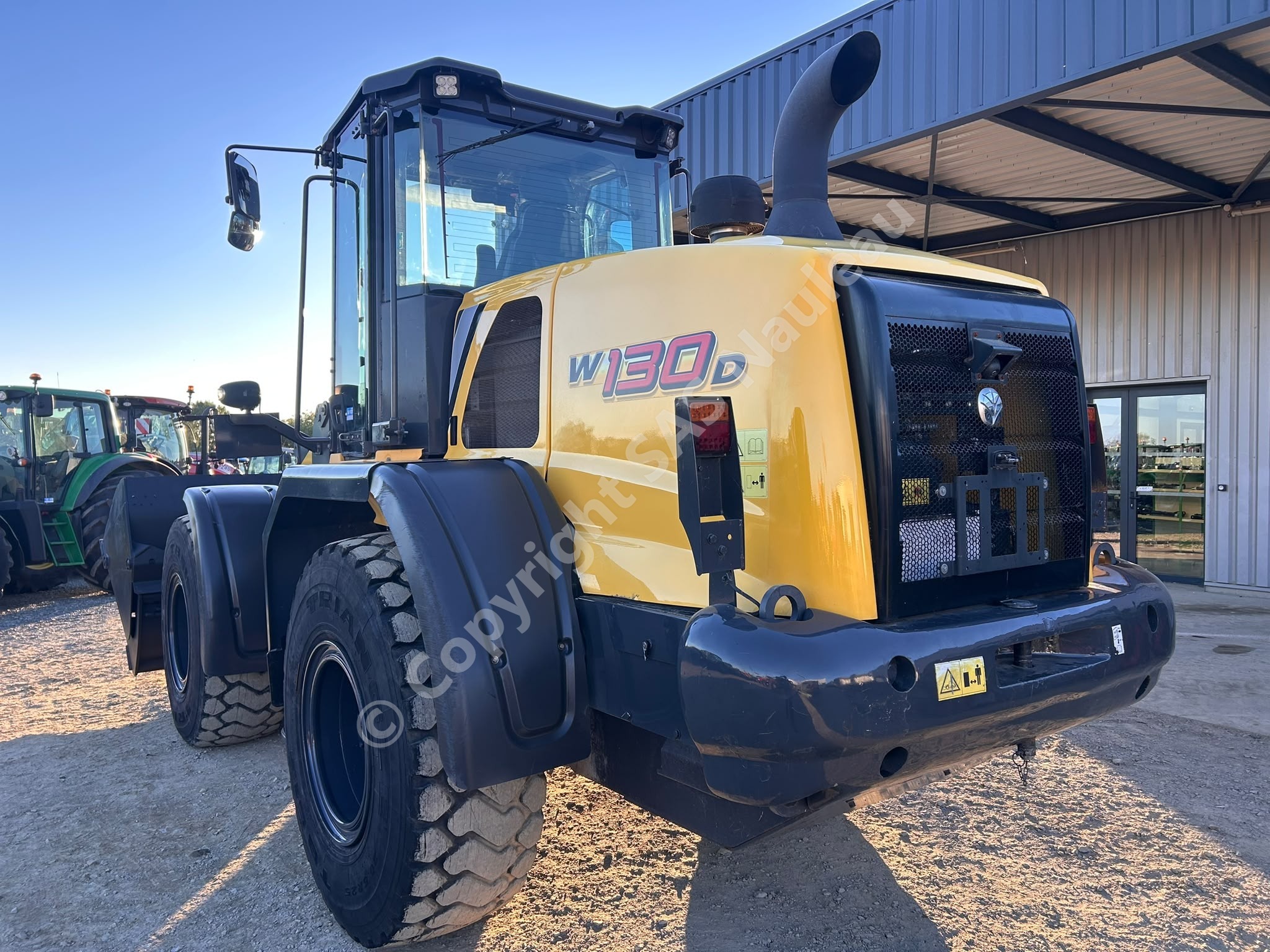 NEW HOLLAND W 130 D