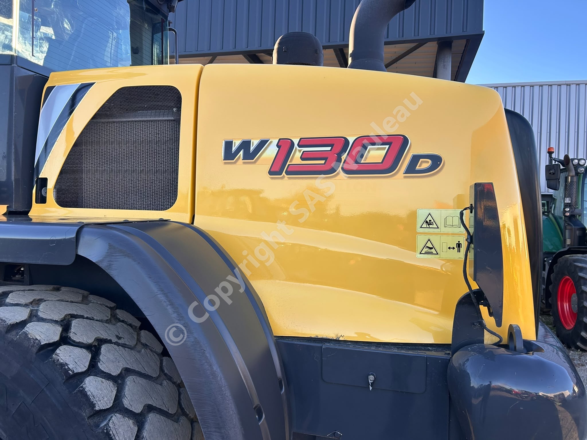 NEW HOLLAND W 130 D