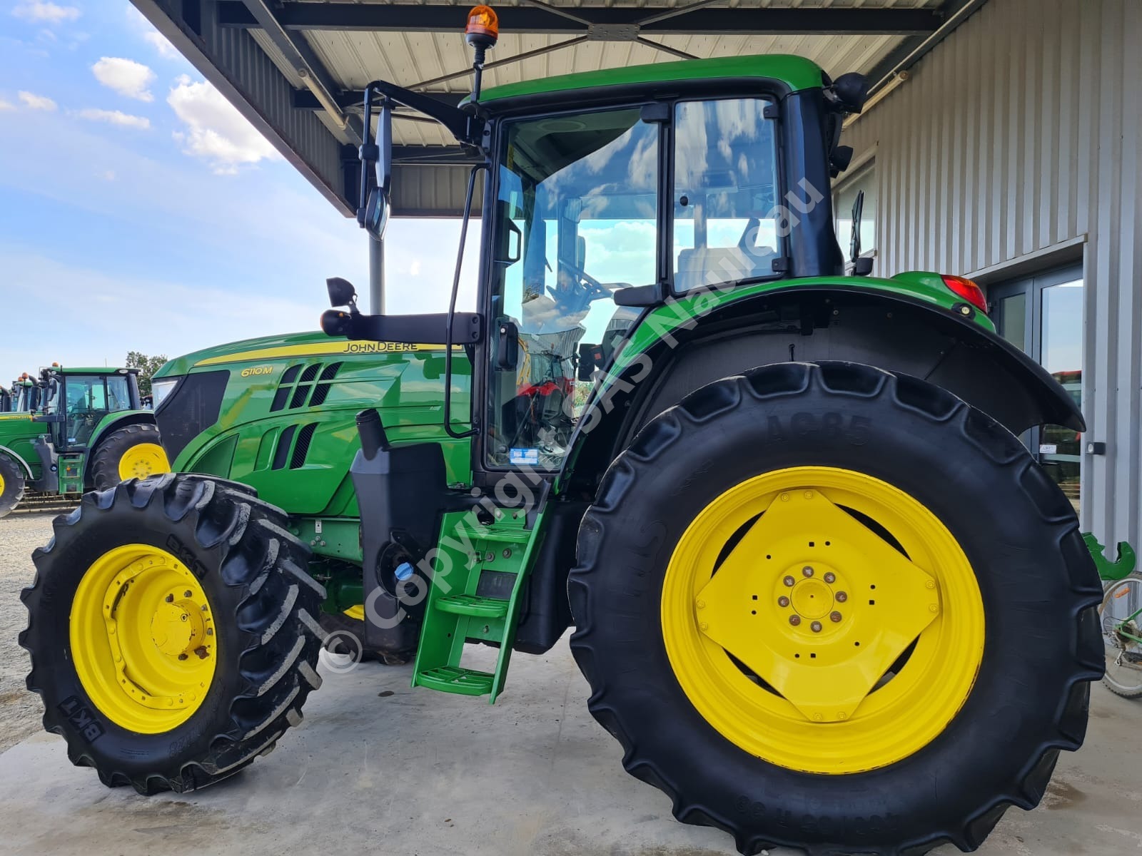 JOHN DEERE 6110M POWER QUAD