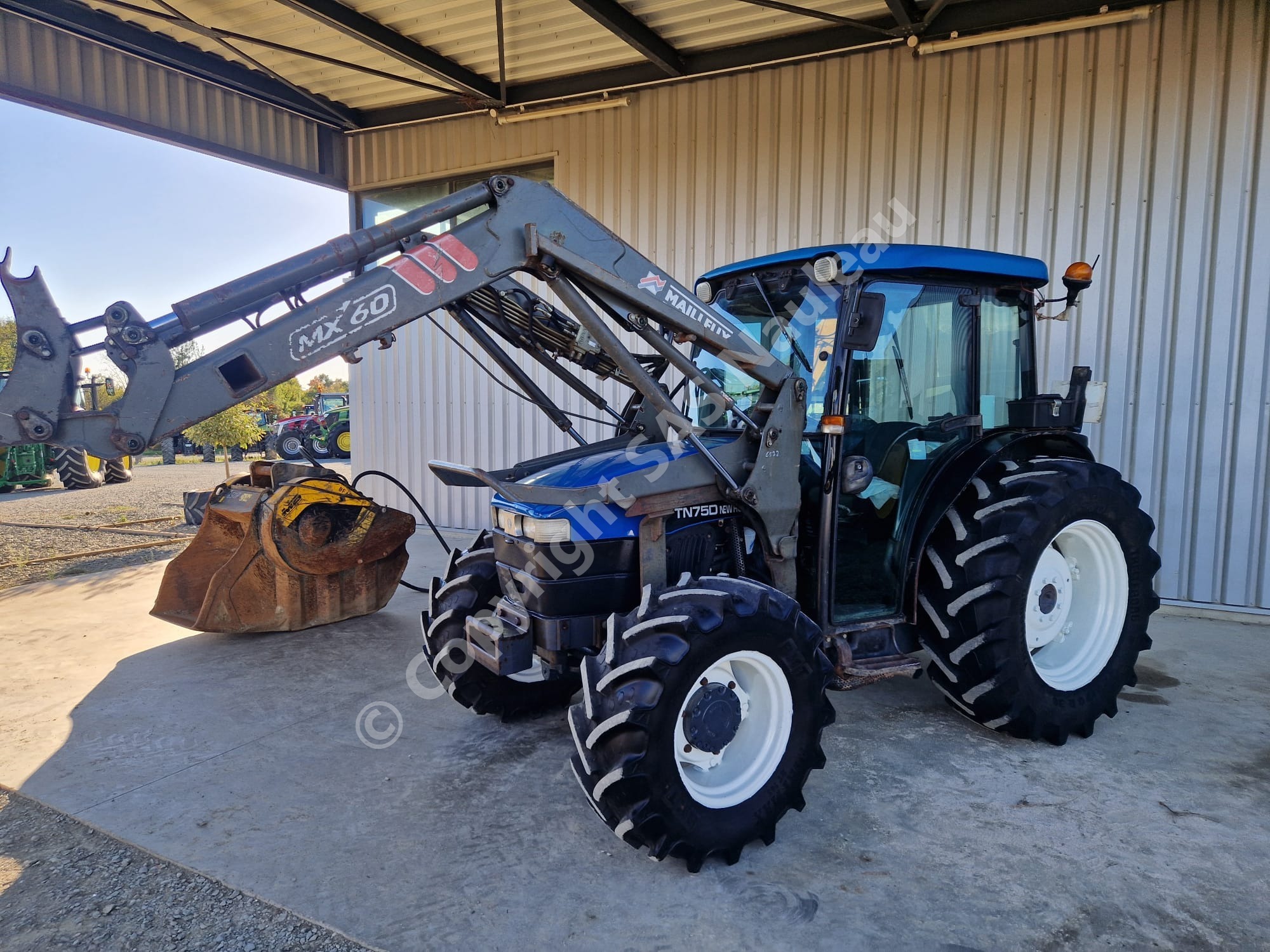 NEW HOLLAND TN75